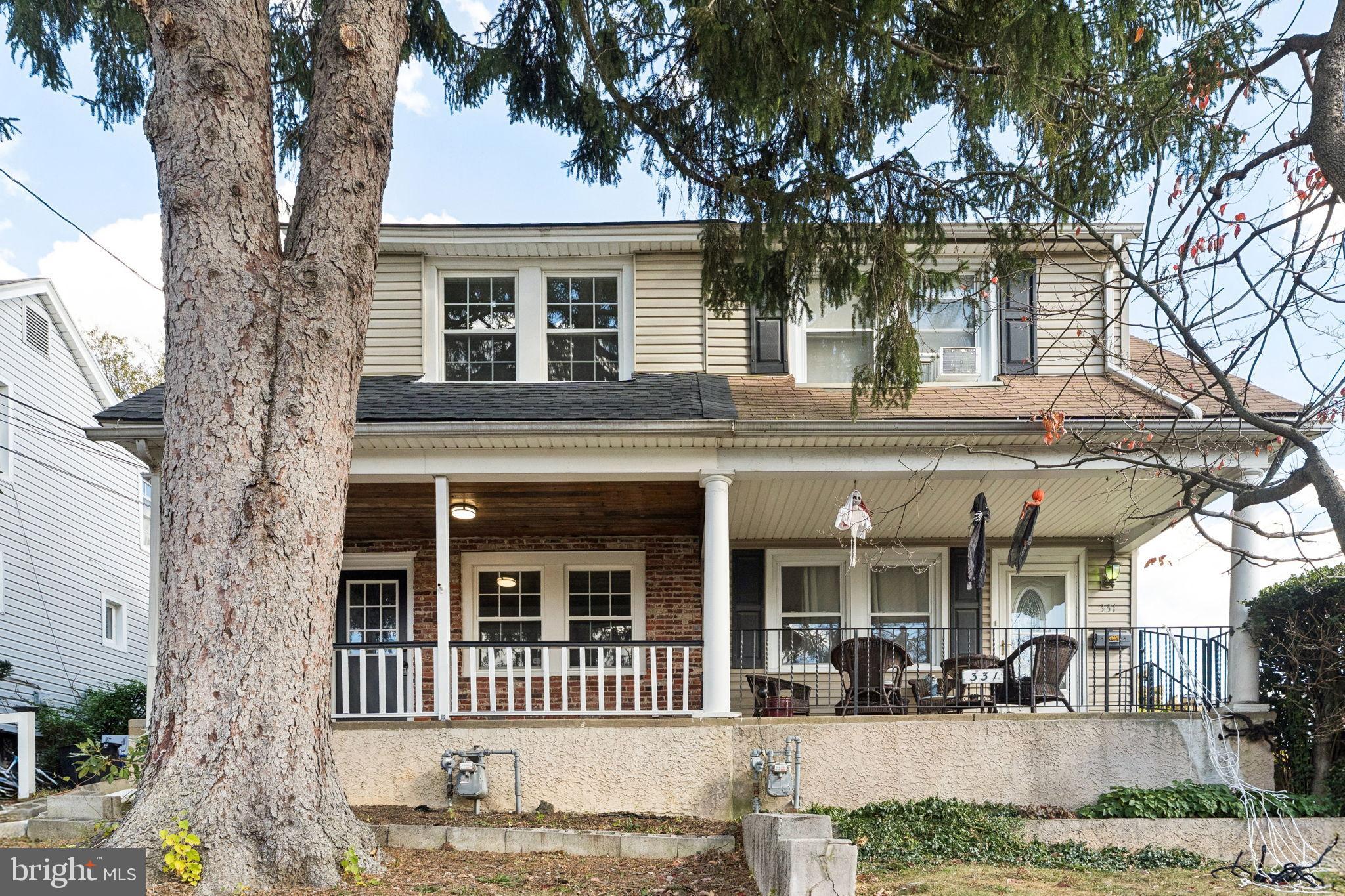333 Blanchard Road Drexel Hill, PA 19026 - Photo 3 of 45 front view of a house with a yard