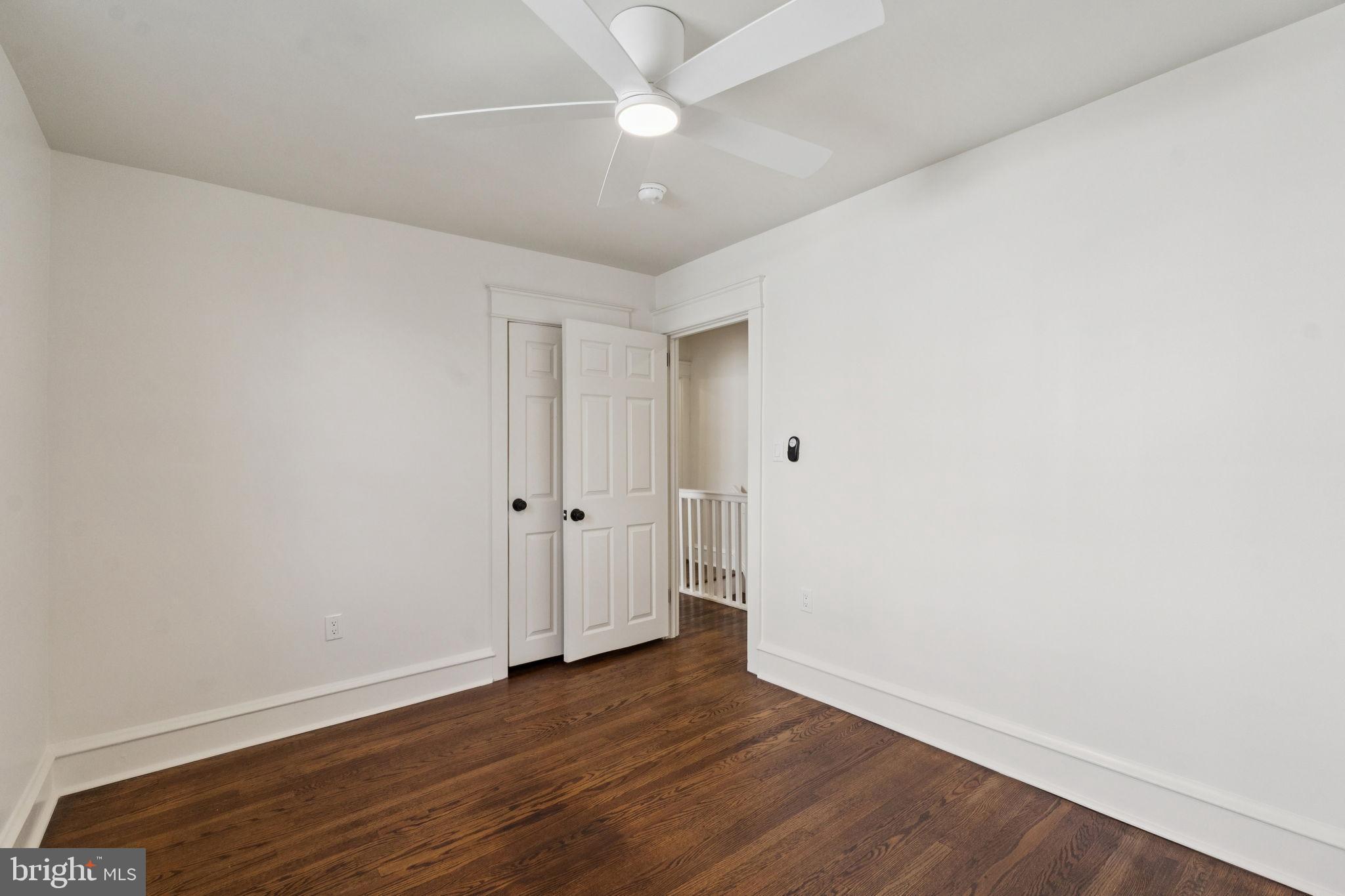 333 Blanchard Road Drexel Hill, PA 19026 - Photo 36 of 45 a view of an empty room with wooden floor