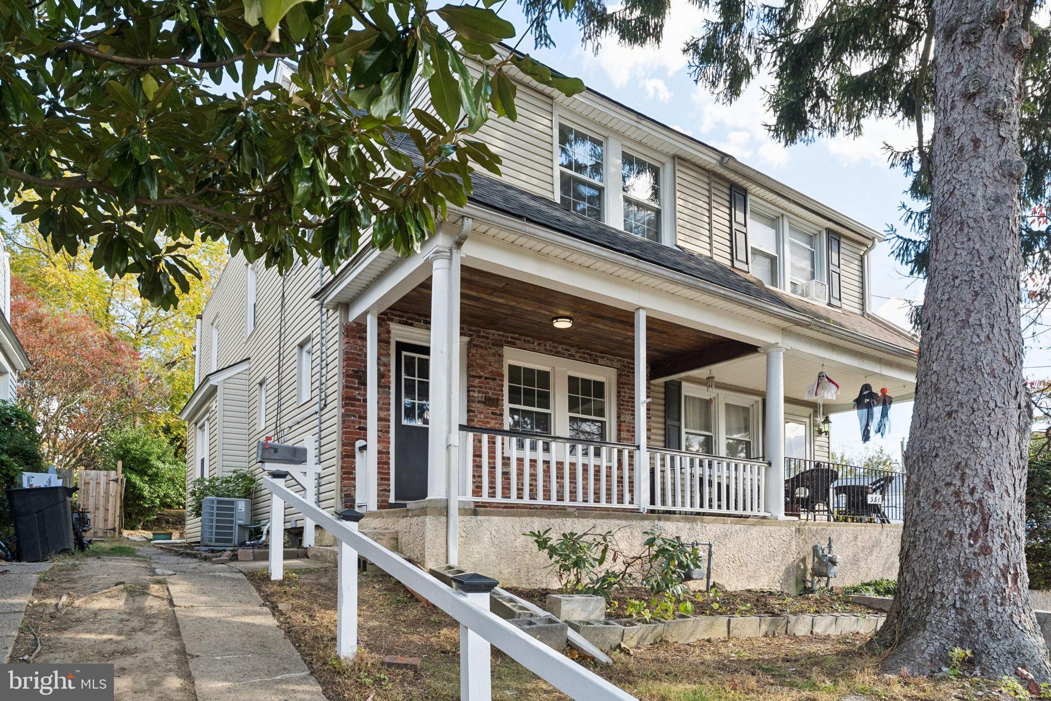 333 Blanchard Road Drexel Hill, PA 19026 - Photo 4 of 45 front view of a house with a tree