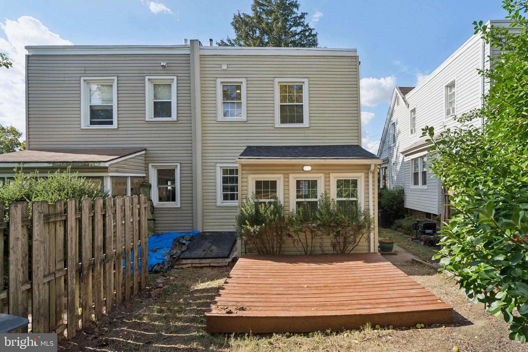 333 Blanchard Road Drexel Hill, PA 19026 - Photo 42 of 45 a view of a house with entrance stairs and a yard