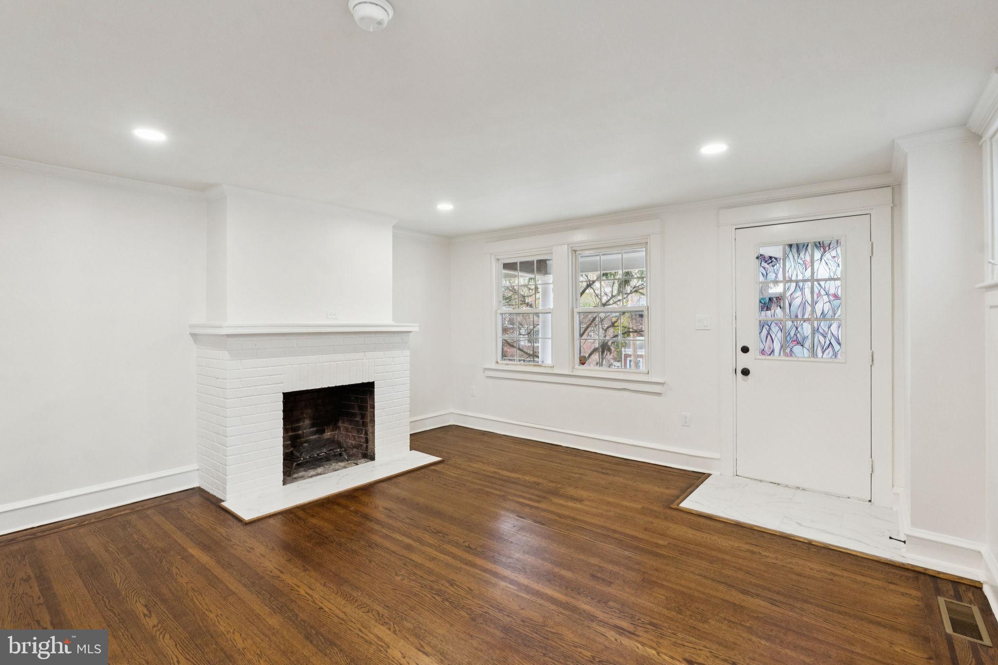 333 Blanchard Road Drexel Hill, PA 19026 - Photo 10 of 45 a view of an empty room with wooden floor and a window