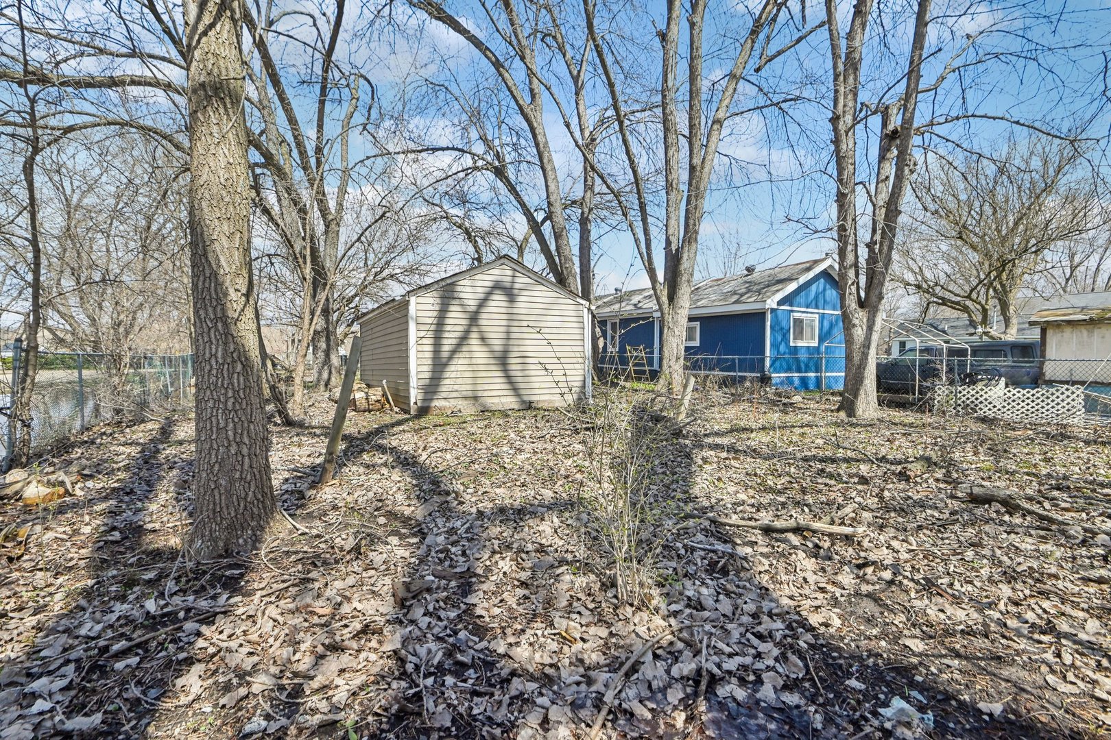 1326 Nippersink Drive Spring Grove, IL 60081 - Photo 11 of 12 a view of a yard with a tree