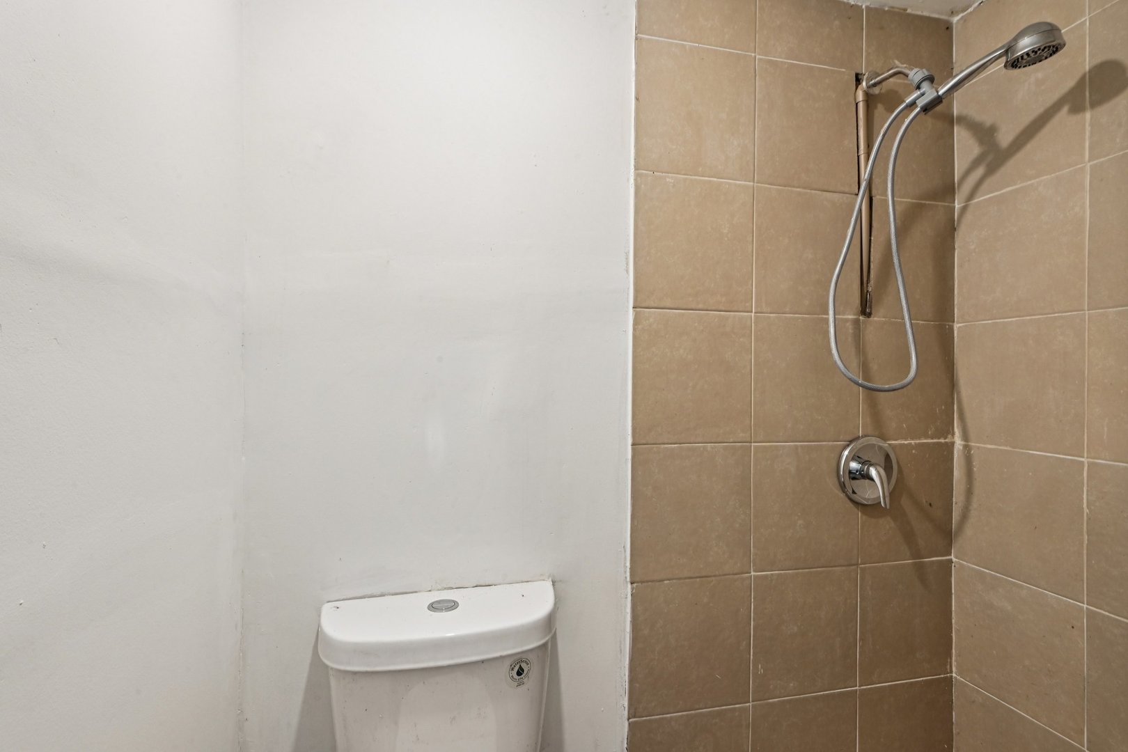 1326 Nippersink Drive Spring Grove, IL 60081 - Photo 8 of 12 a bathroom with a toilet and a shower