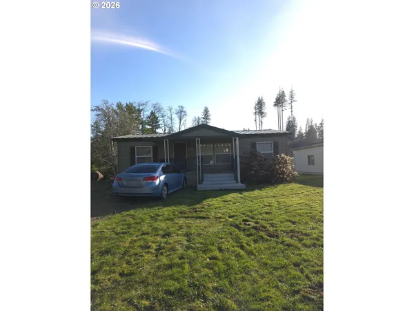 a view of a porch in front of a house