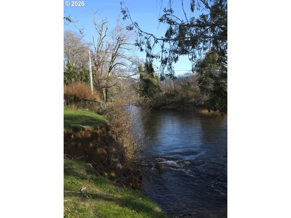 a view of a house with a fence