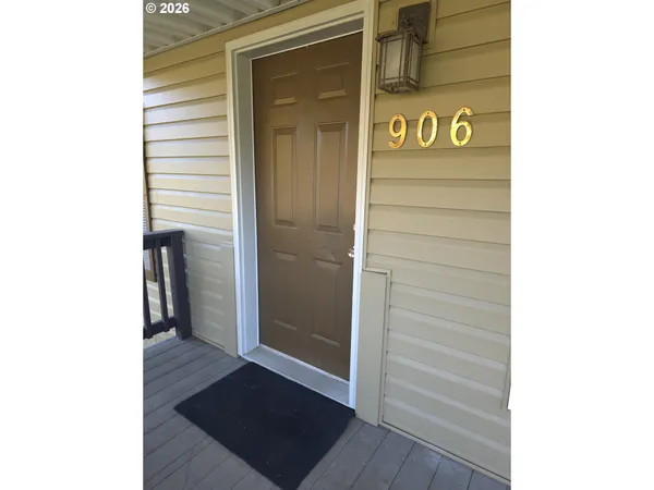 a view of a livingroom with wooden floor