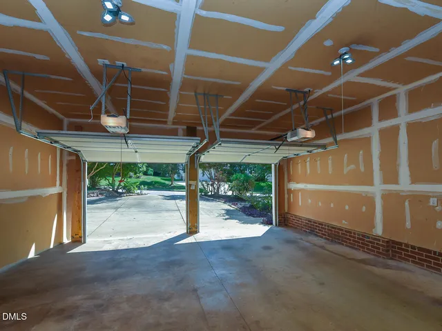 a view of an entryway with wooden floor and windows