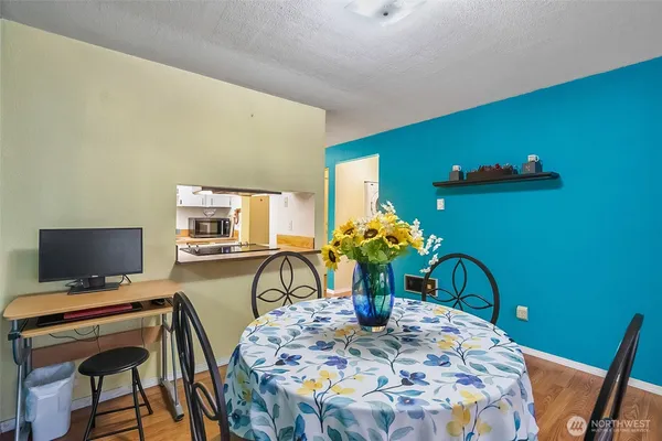 a view of a dining room with furniture