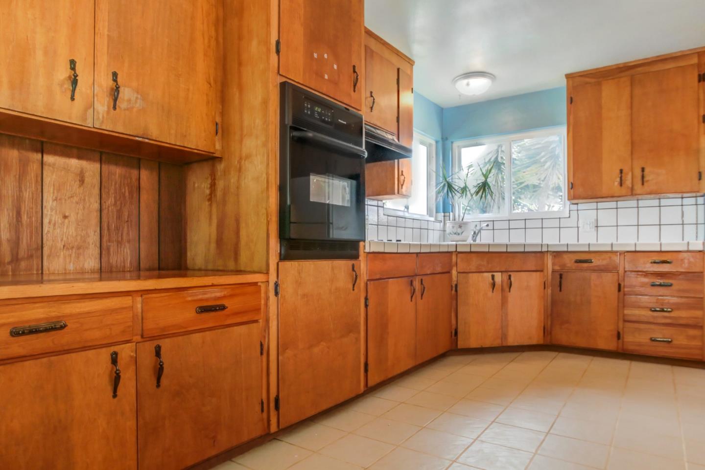 85 Kerr Road Watsonville, CA 95076 - Photo 4 of 29 a kitchen with granite countertop a sink