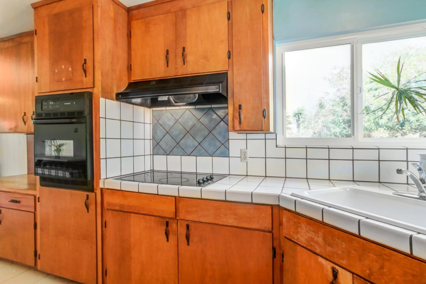 85 Kerr Road Watsonville, CA 95076 - Photo 5 of 29 a bathroom with a sink and a mirror