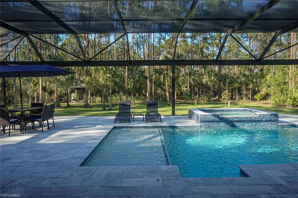 Undisclosed Address Naples, FL 34117 - Photo 5 of 23 a view of park with a slide