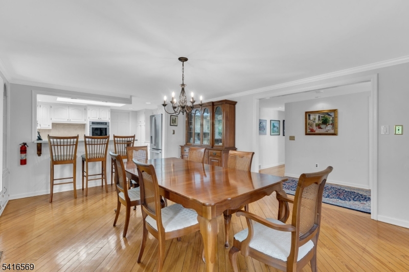 149 Lake End Road Newfoundland, NJ 07435 - Photo 11 of 49 a view of a dining room with furniture and wooden floor