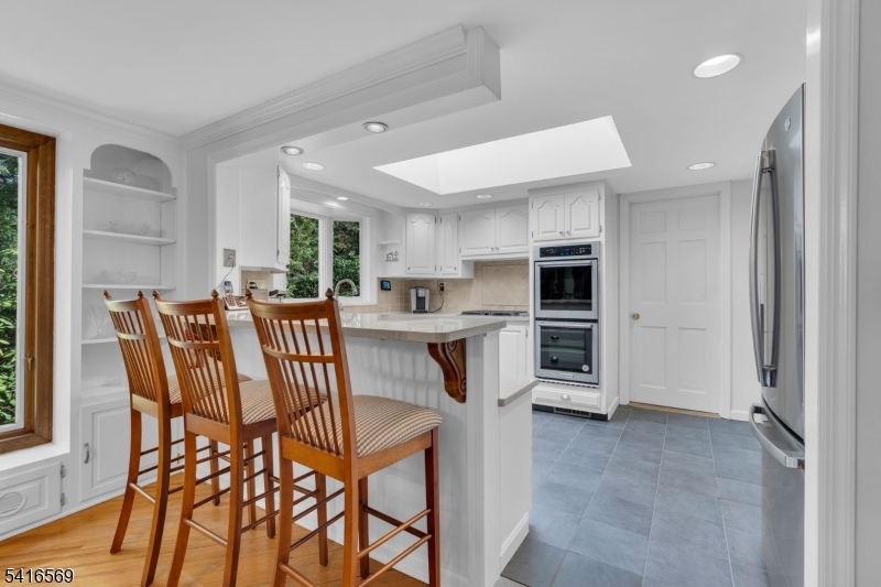 149 Lake End Road Newfoundland, NJ 07435 - Photo 13 of 49 a view of a dining room kitchen and a window