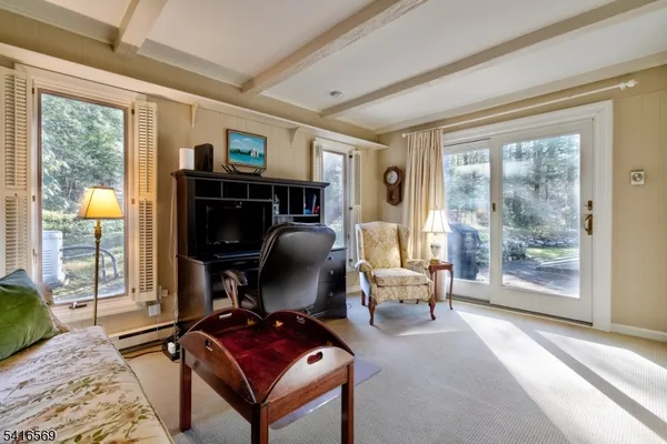 a view of workspace with large windows