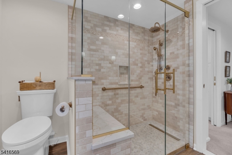 149 Lake End Road Newfoundland, NJ 07435 - Photo 22 of 49 a bathroom with a shower and toilet