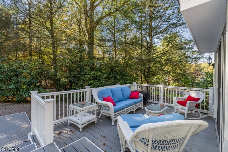 149 Lake End Road Newfoundland, NJ 07435 - Photo 33 of 49 an outdoor sitting area with furniture and wooden floor