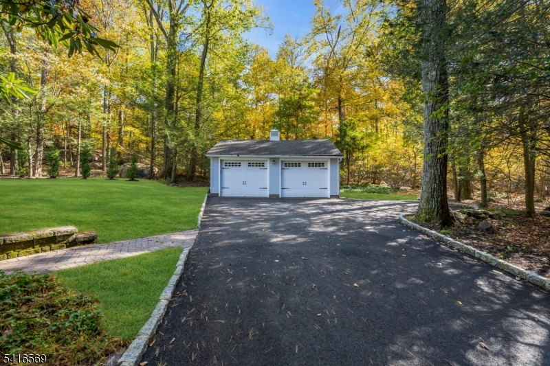 149 Lake End Road Newfoundland, NJ 07435 - Photo 35 of 49 a view of a house with backyard and trees