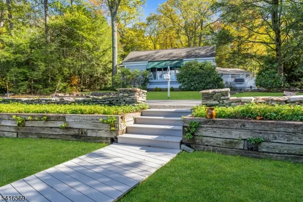a view of yard with outdoor seating