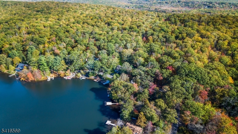 149 Lake End Road Newfoundland, NJ 07435 - Photo 42 of 49 a view of a lake with a house