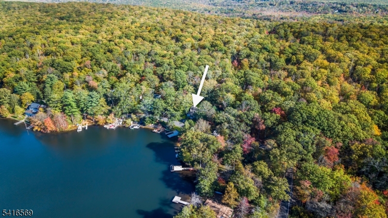 149 Lake End Road Newfoundland, NJ 07435 - Photo 43 of 49 a view of a lake with a house