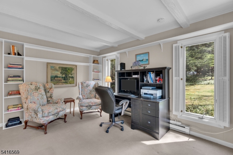 149 Lake End Road Newfoundland, NJ 07435 - Photo 48 of 49 a view of a livingroom with workspace and a window