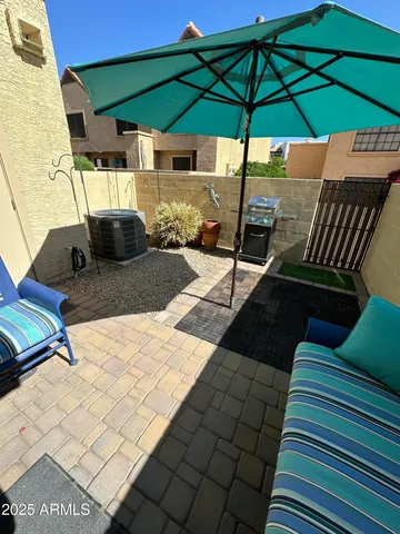 a view of an outdoor space with sitting area