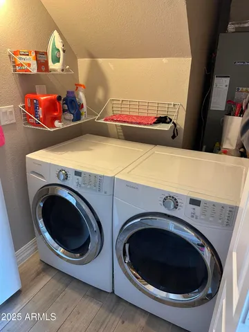 a utility room with dryer and washer