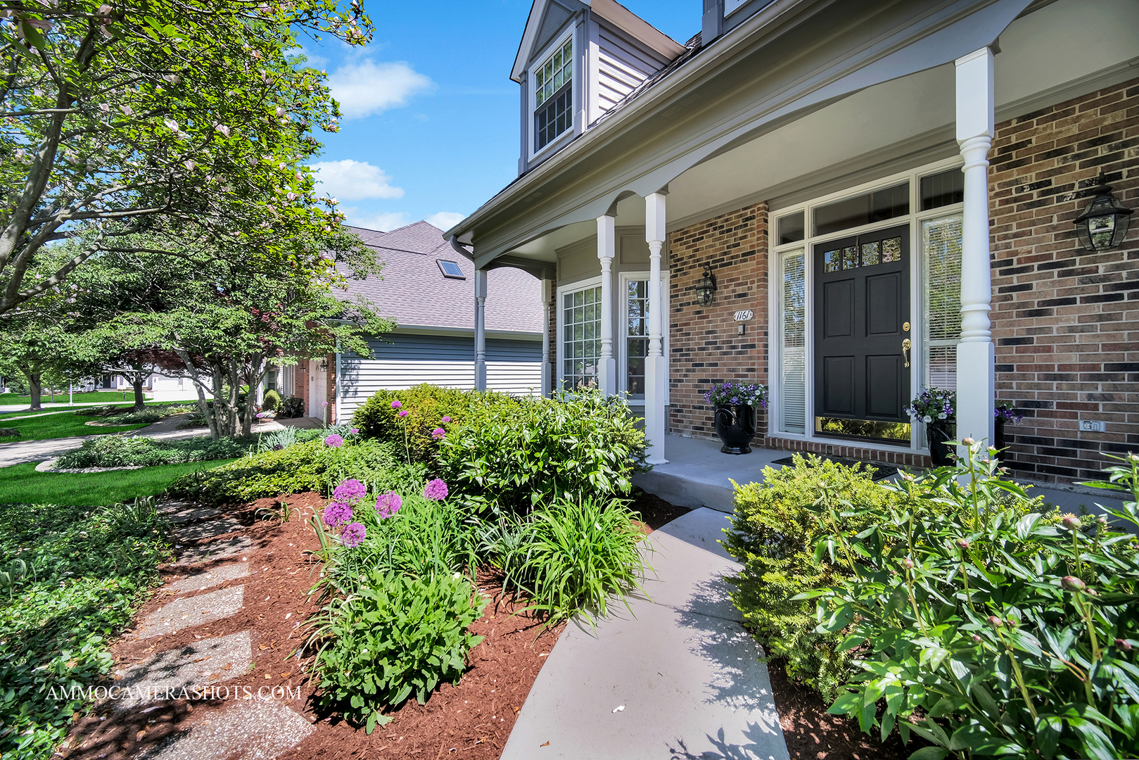 1161 Midwest Lane Wheaton, IL 60189 - Photo 3 of 45 front view of a house with a yard