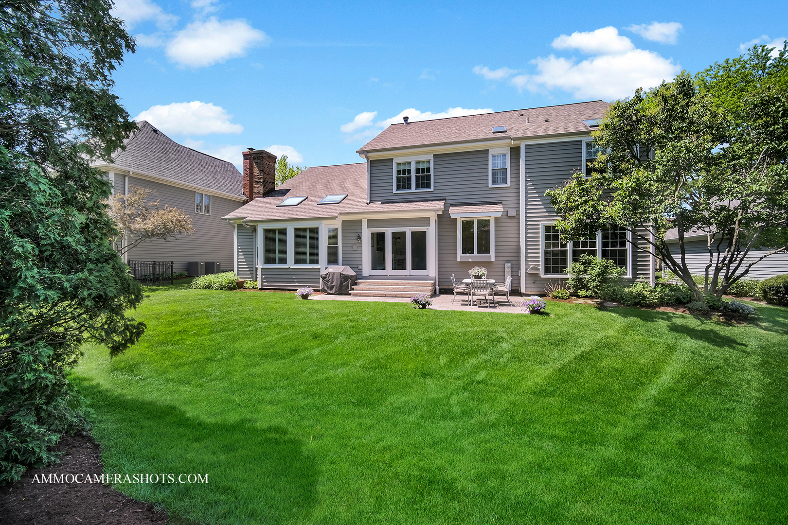 1161 Midwest Lane Wheaton, IL 60189 - Photo 42 of 45 a front view of a house with yard and green space