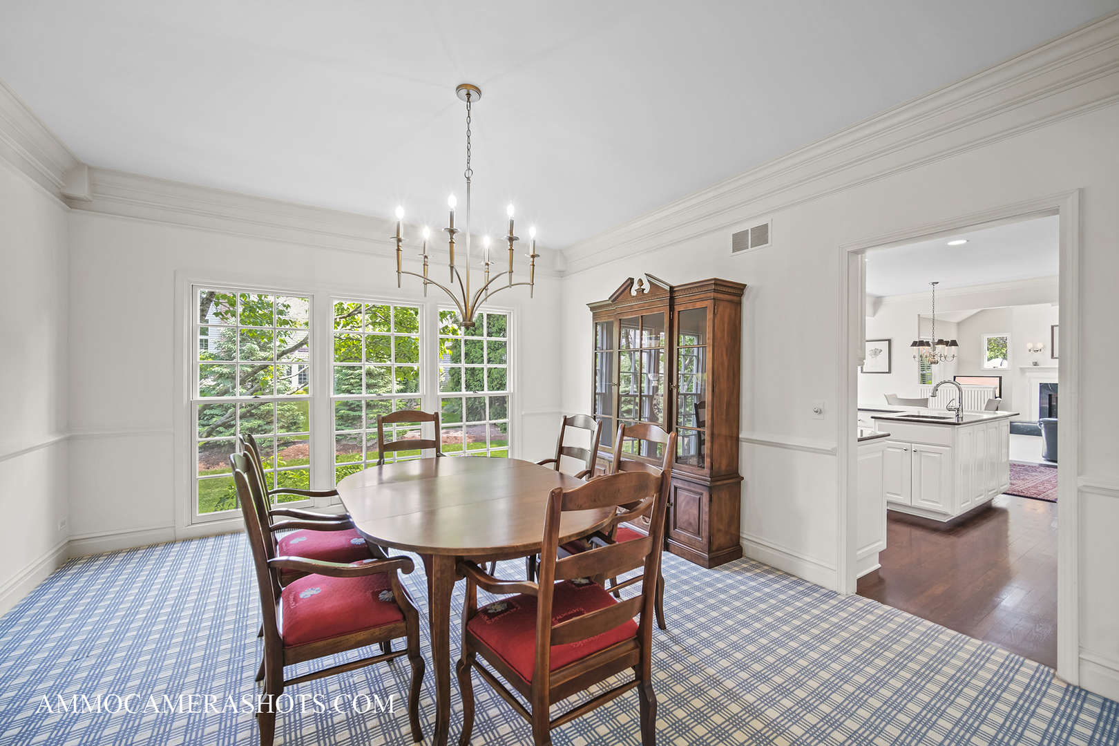 1161 Midwest Lane Wheaton, IL 60189 - Photo 6 of 45 a dining room with furniture a chandelier and wooden floor