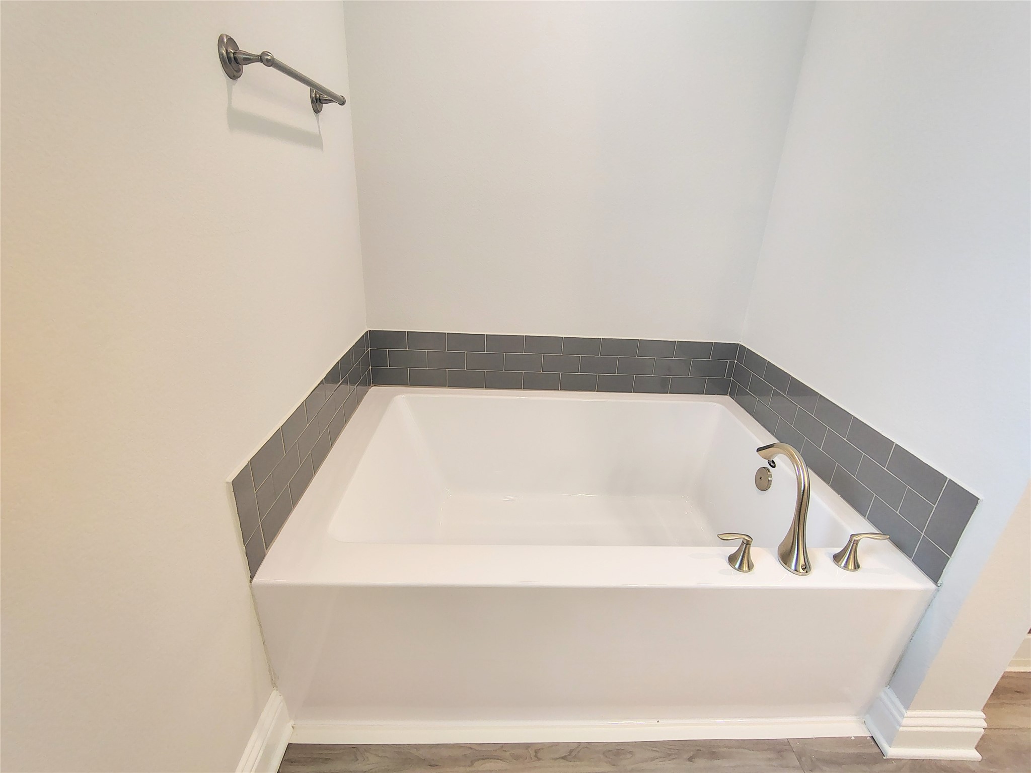 601 Greystone Lane Angleton, TX 77515 - Photo 19 of 31 a bathroom with a bathtub