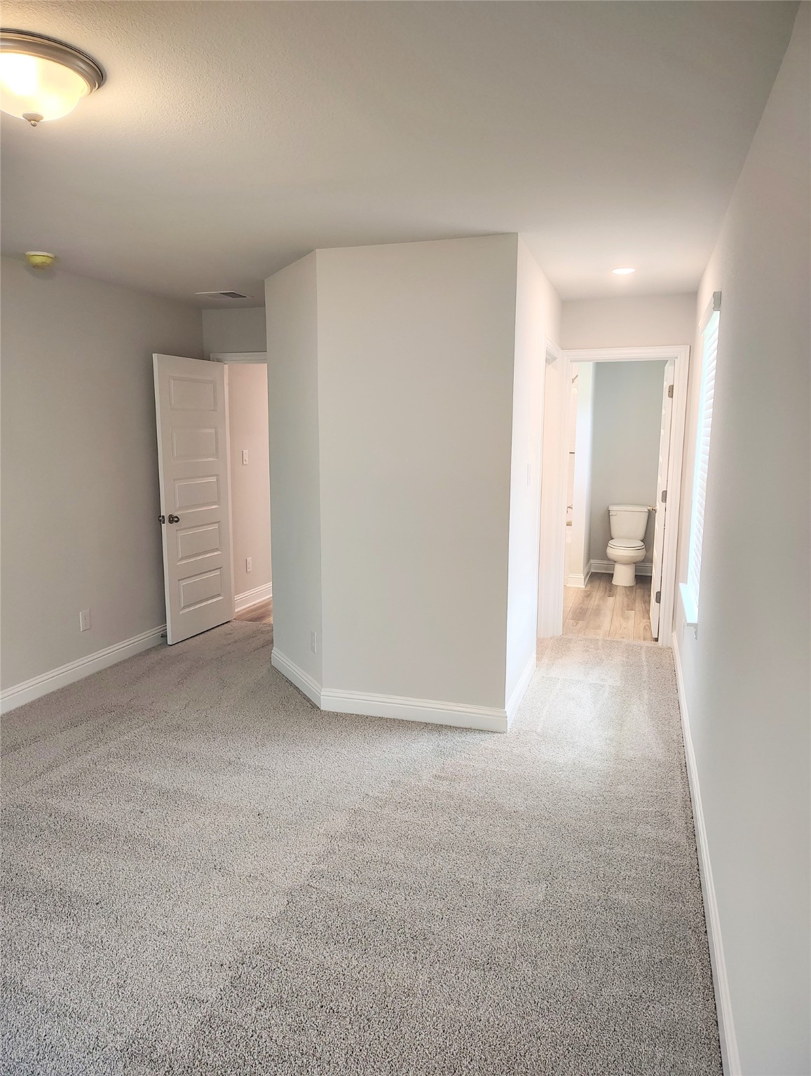 601 Greystone Lane Angleton, TX 77515 - Photo 21 of 31 a view of a room with a hallway