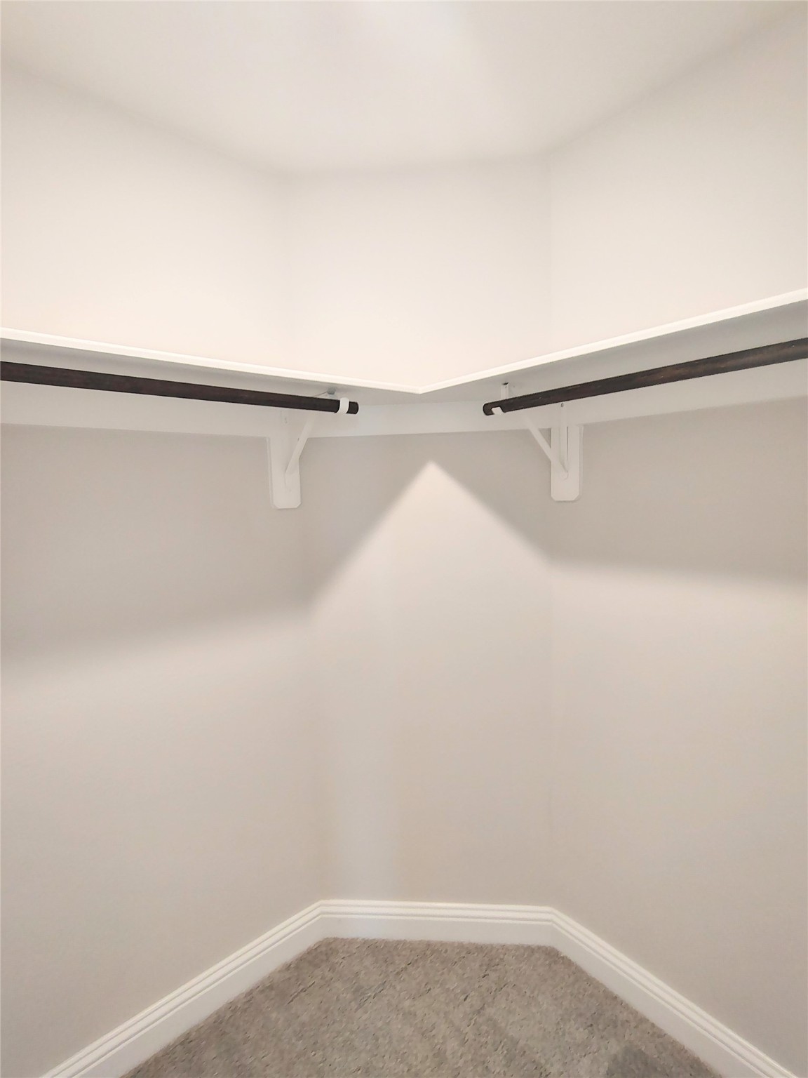 601 Greystone Lane Angleton, TX 77515 - Photo 23 of 31 a view of small space with racks on the wall