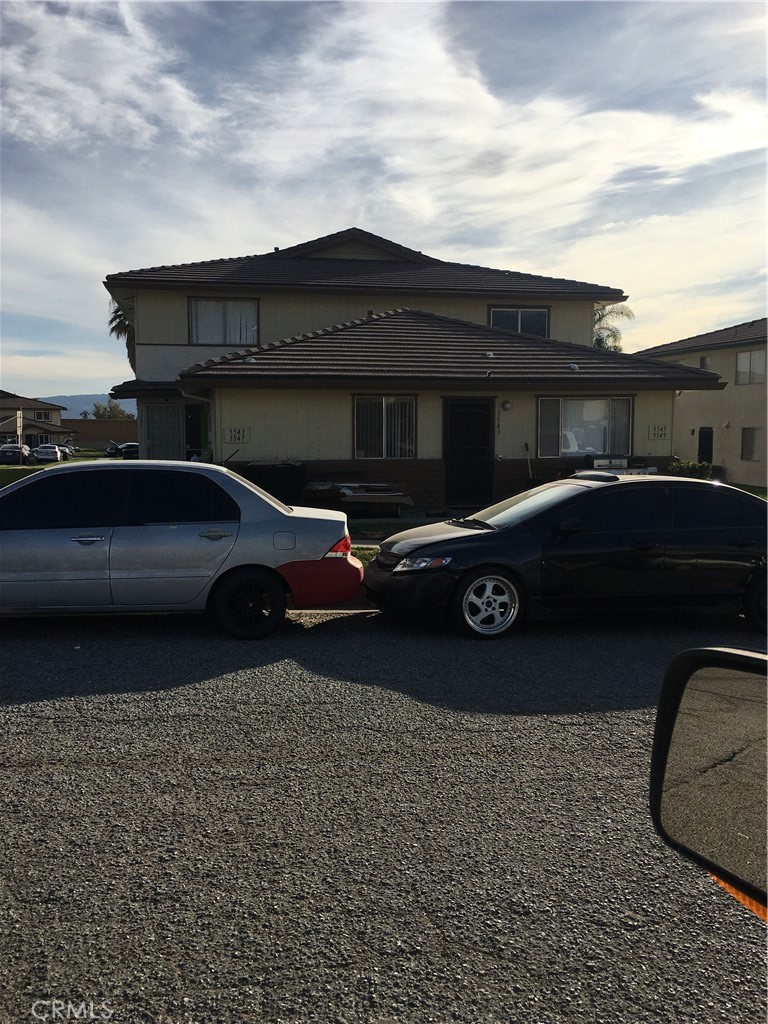 a car parked in front of a house