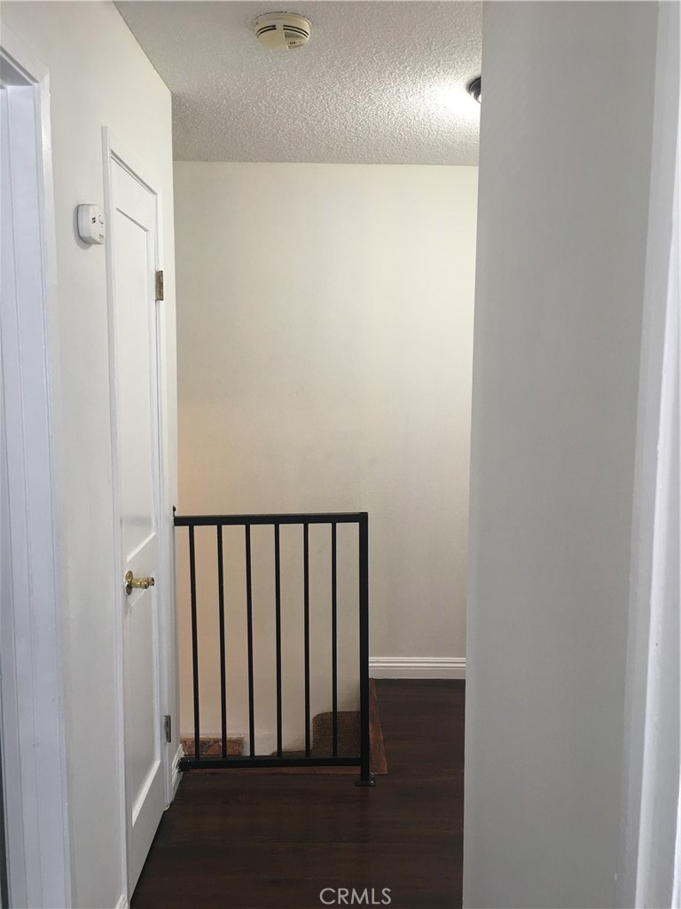 3545 20th Street Highland, CA 92346 - Photo 11 of 12 a view of entryway with wooden floor