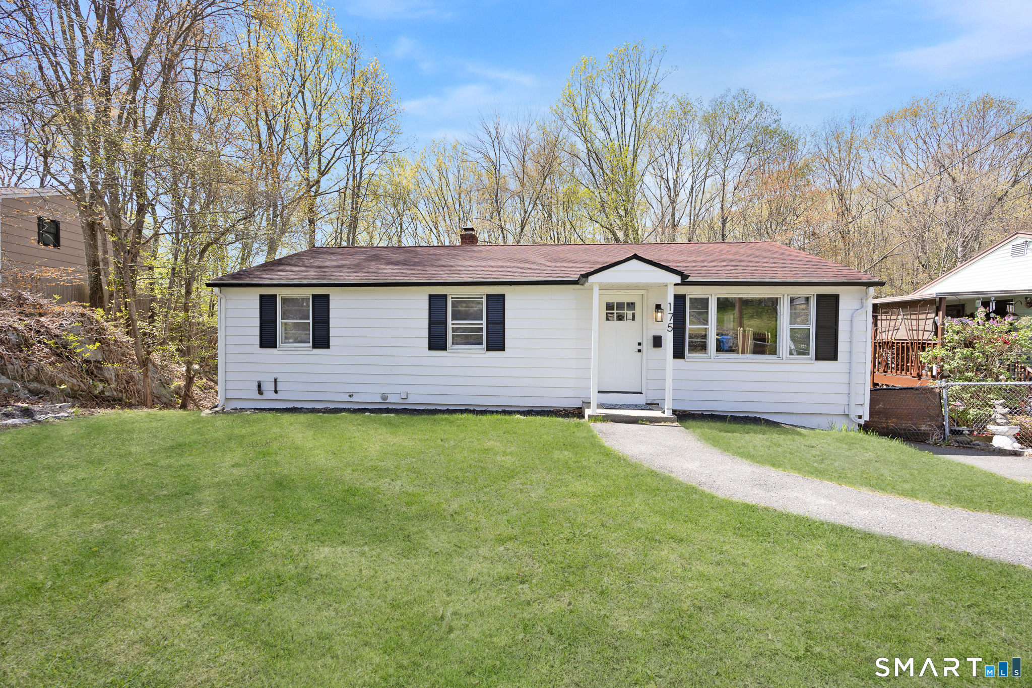 175 Devonwood Drive Waterbury, CT 06708 - Photo 1 of 30 a front view of a house with garden