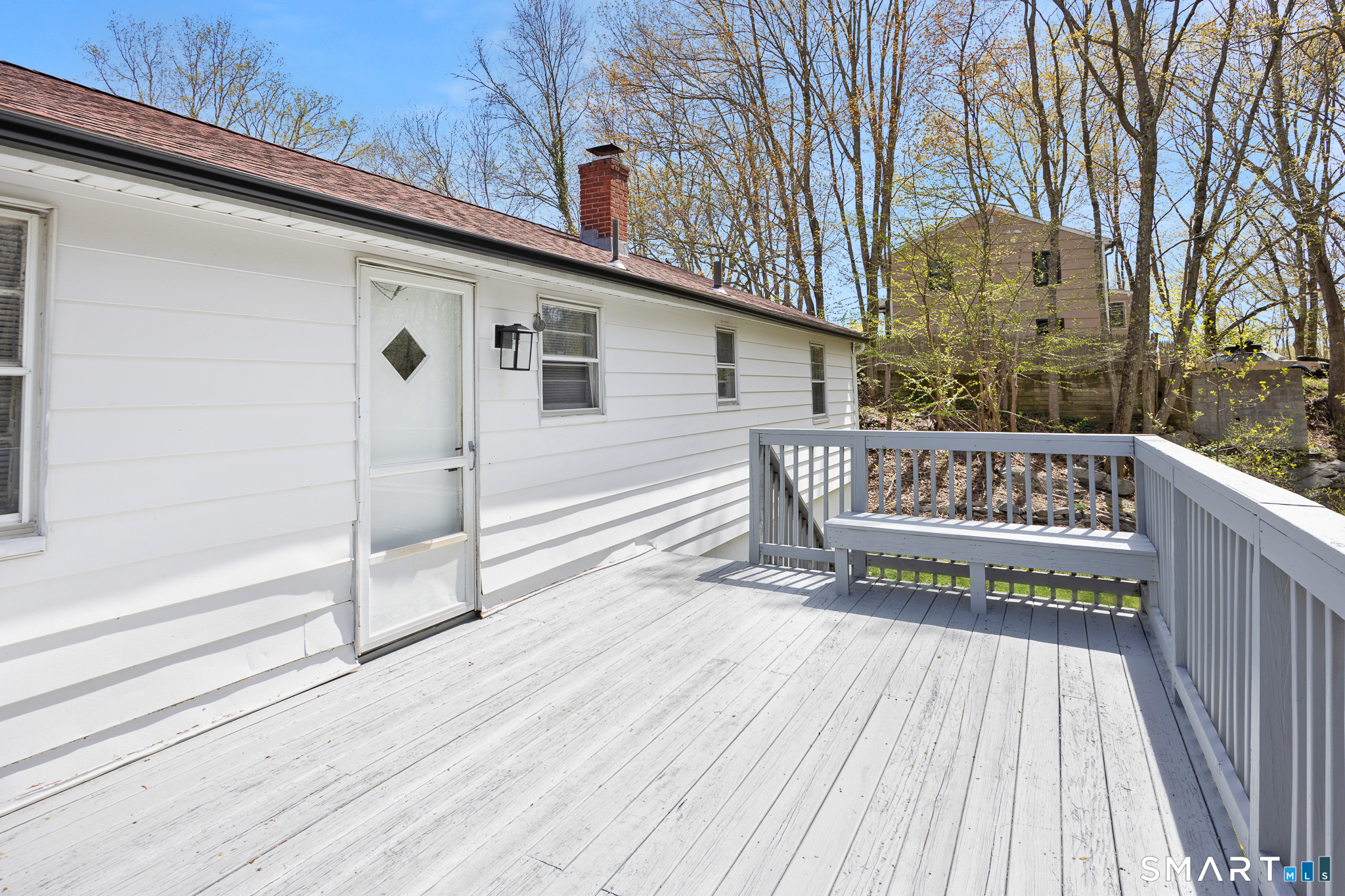175 Devonwood Drive Waterbury, CT 06708 - Photo 26 of 30 a view of a wooden deck