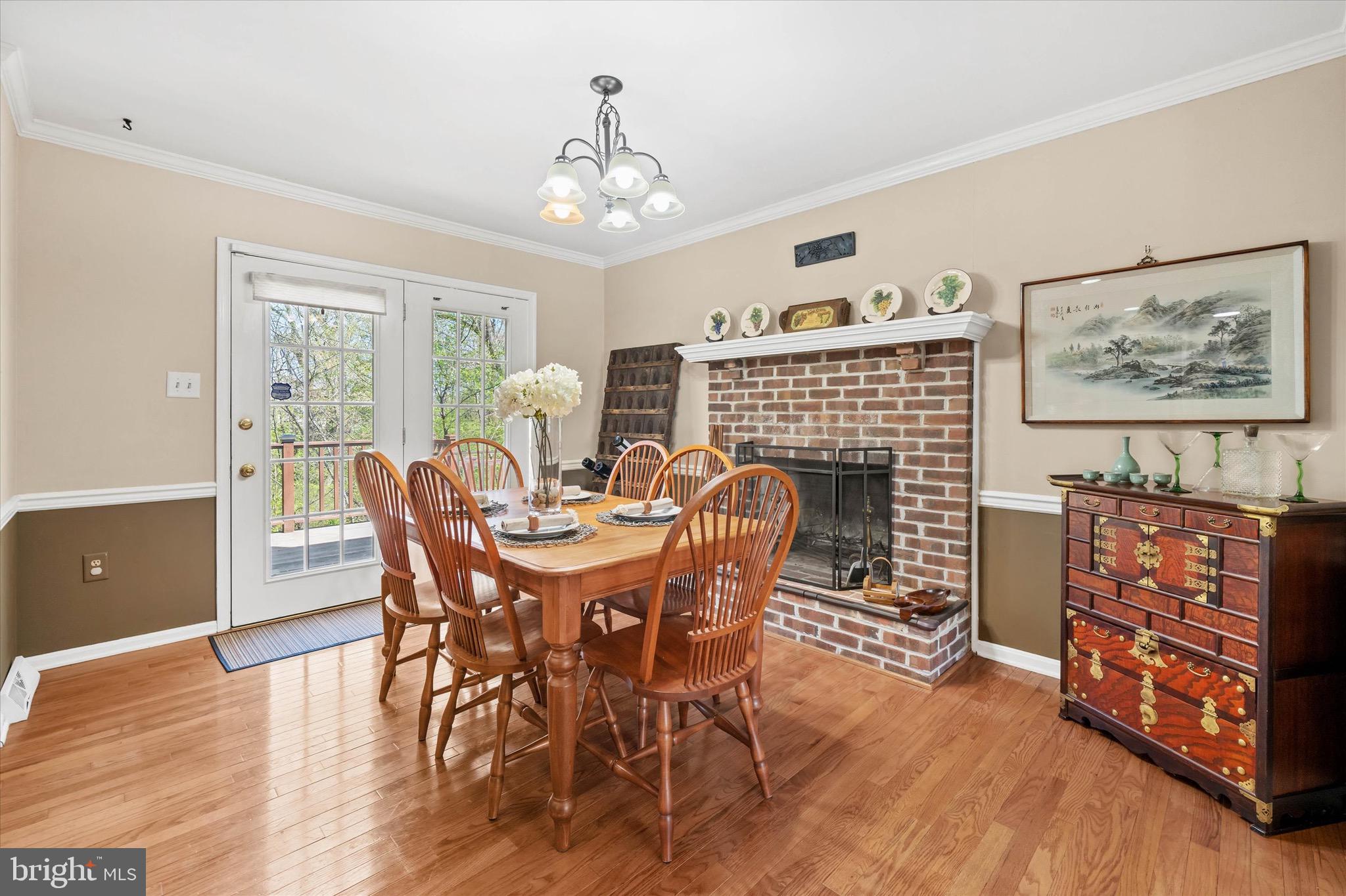 701 Christopher Drive Middletown, DE 19709 - Photo 20 of 57 a view of a dining room with furniture window and wooden floor
