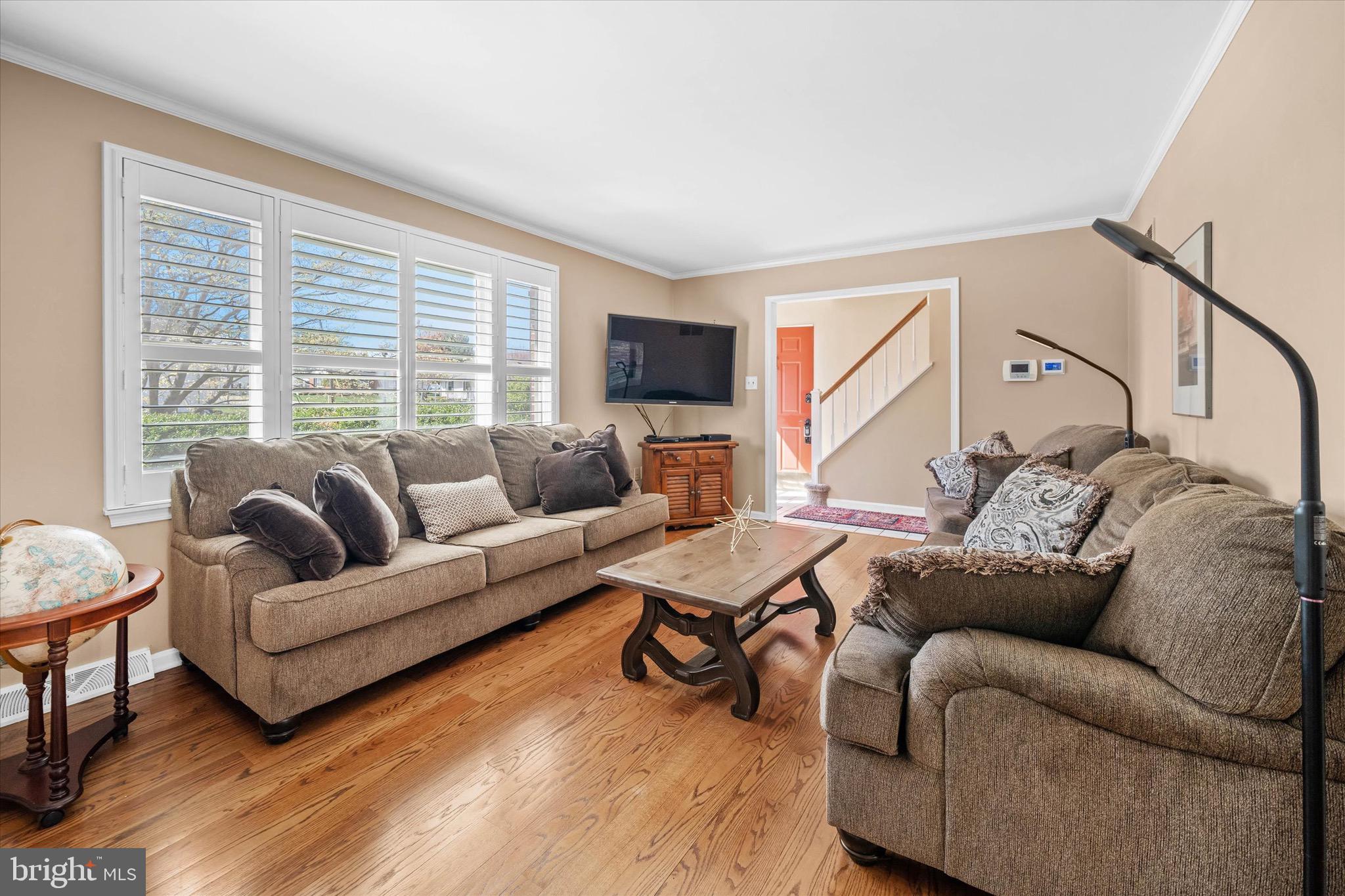 701 Christopher Drive Middletown, DE 19709 - Photo 22 of 57 a living room with furniture and a flat screen tv