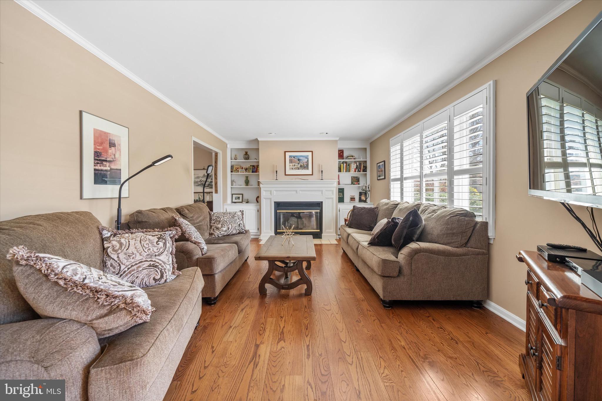 701 Christopher Drive Middletown, DE 19709 - Photo 23 of 57 a living room with furniture and a fireplace