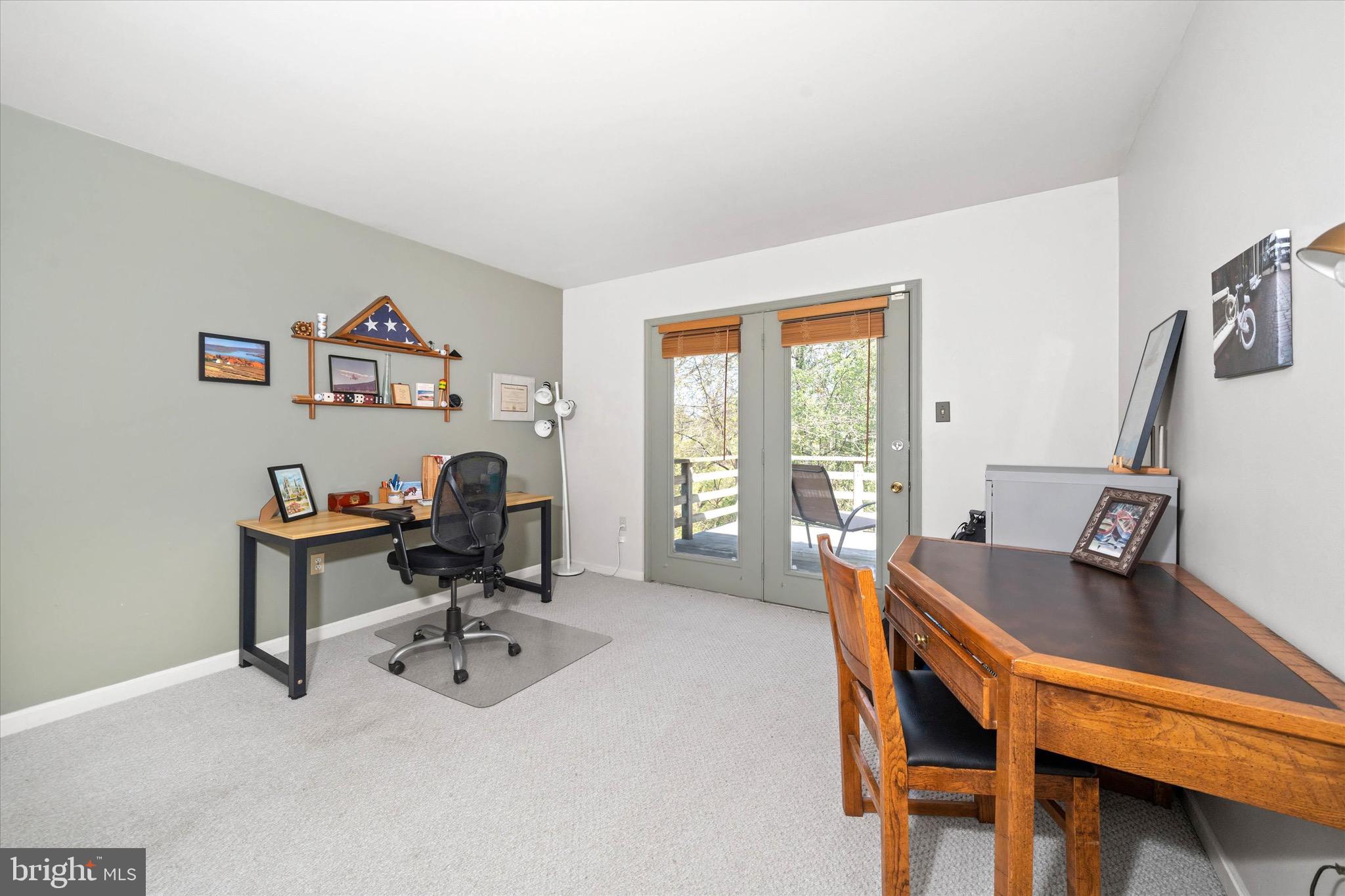 701 Christopher Drive Middletown, DE 19709 - Photo 27 of 57 a view of a workspace with furniture and a window