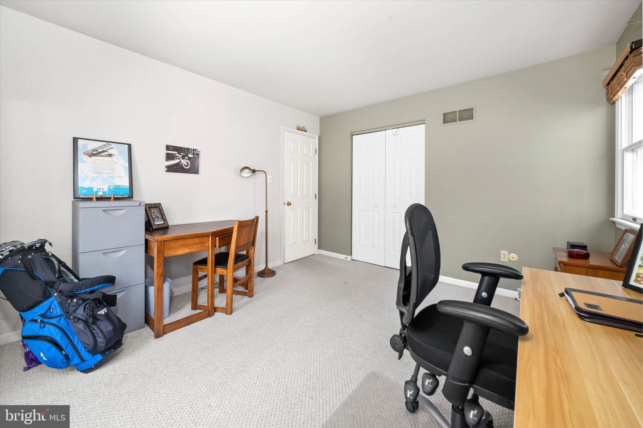 701 Christopher Drive Middletown, DE 19709 - Photo 28 of 57 a view of a workspace with furniture and a window