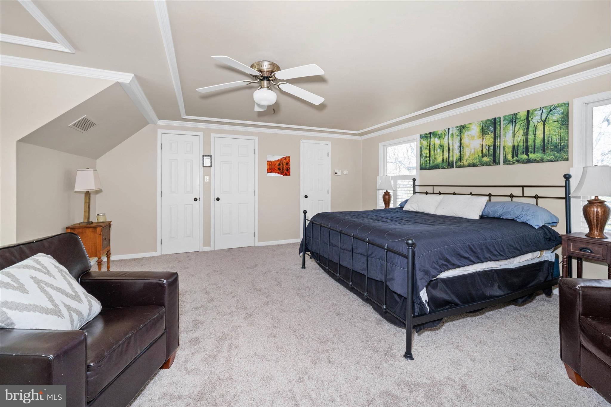 701 Christopher Drive Middletown, DE 19709 - Photo 32 of 57 a bedroom with a bed and wooden floor