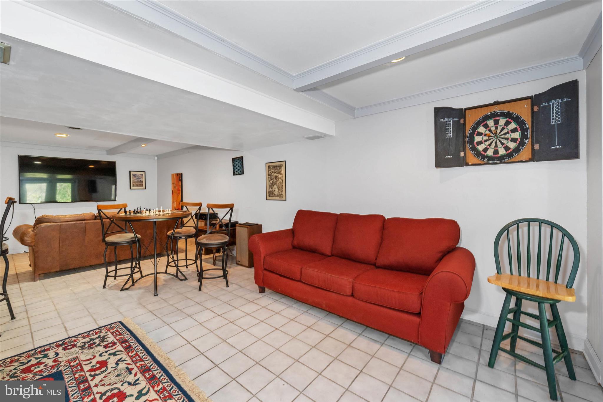 701 Christopher Drive Middletown, DE 19709 - Photo 37 of 57 a living room with furniture wooden floor and a rug