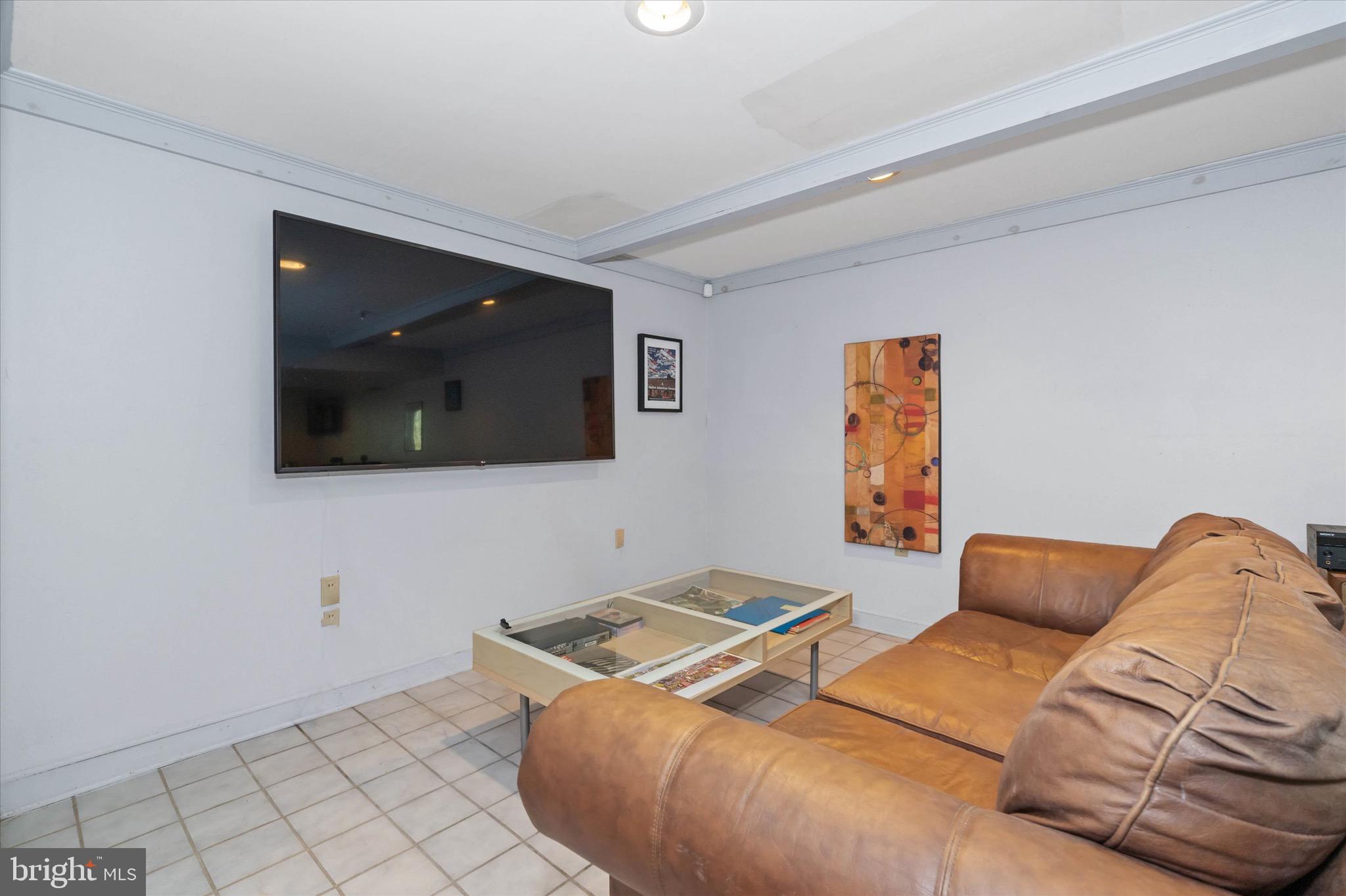 701 Christopher Drive Middletown, DE 19709 - Photo 39 of 57 a living room with a couch