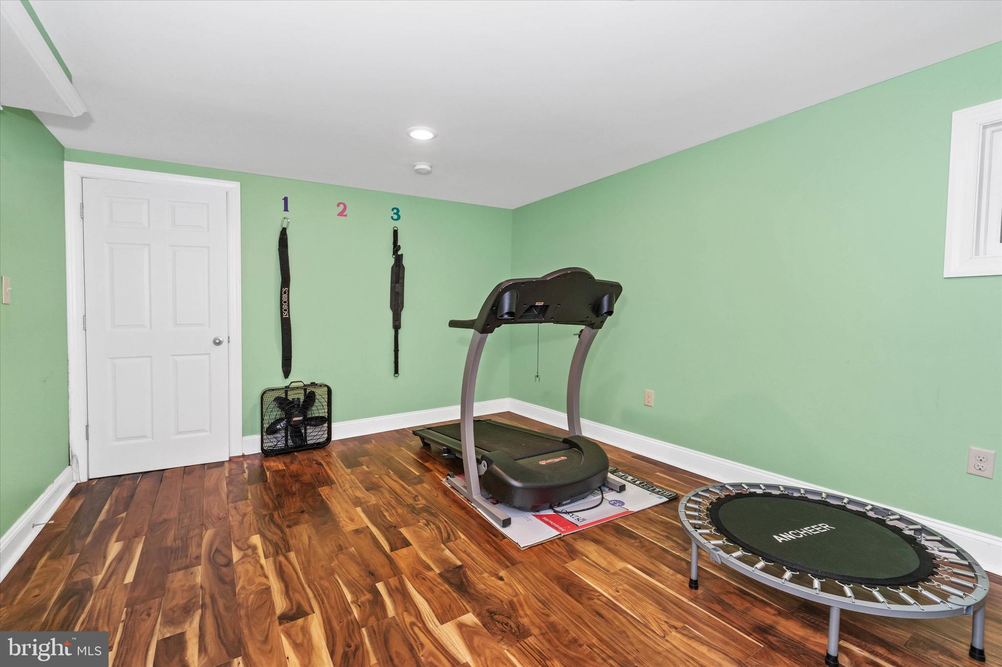701 Christopher Drive Middletown, DE 19709 - Photo 43 of 57 a room with wooden floor and furniture