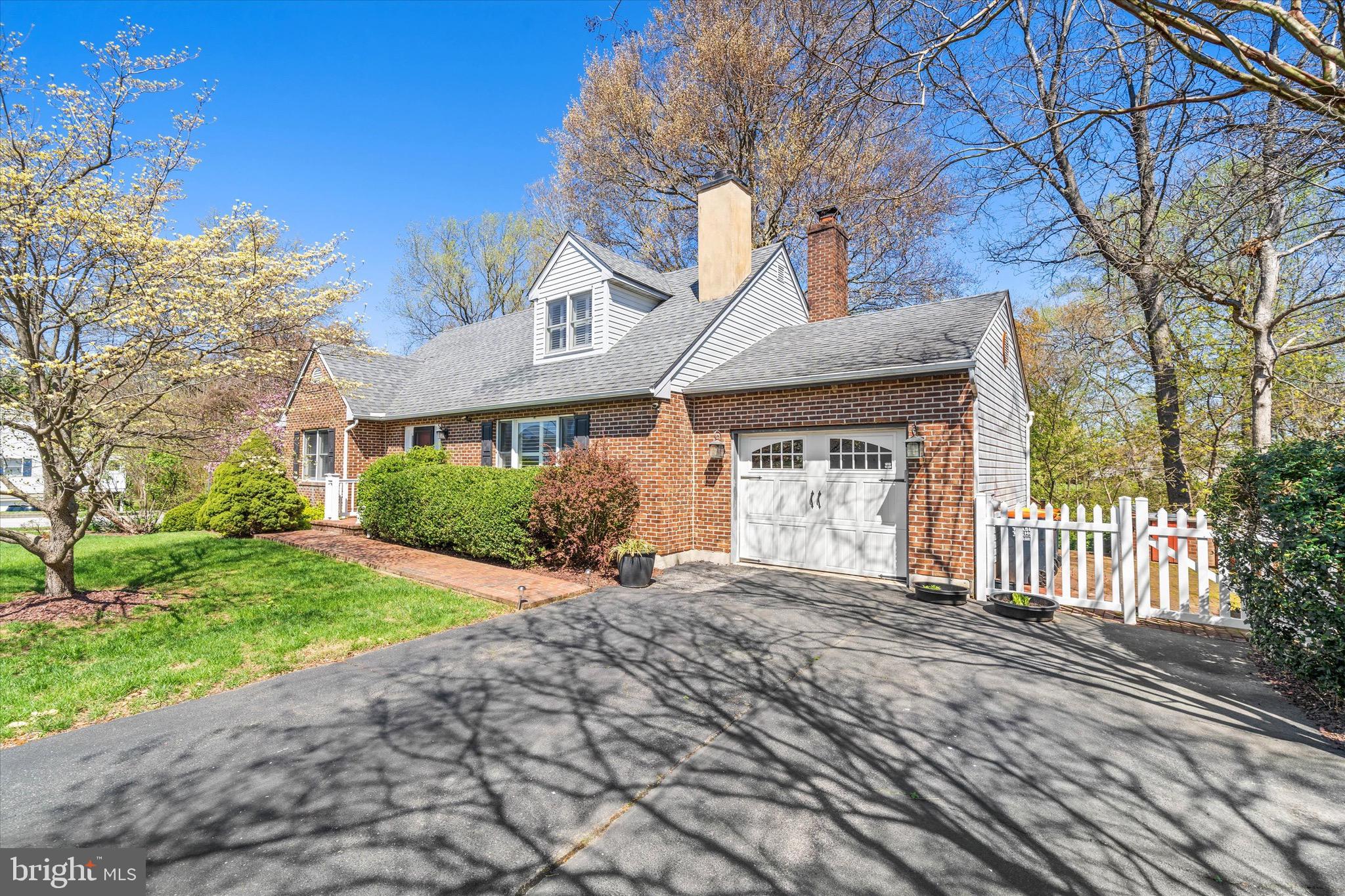701 Christopher Drive Middletown, DE 19709 - Photo 6 of 57 a front view of a house with a garden