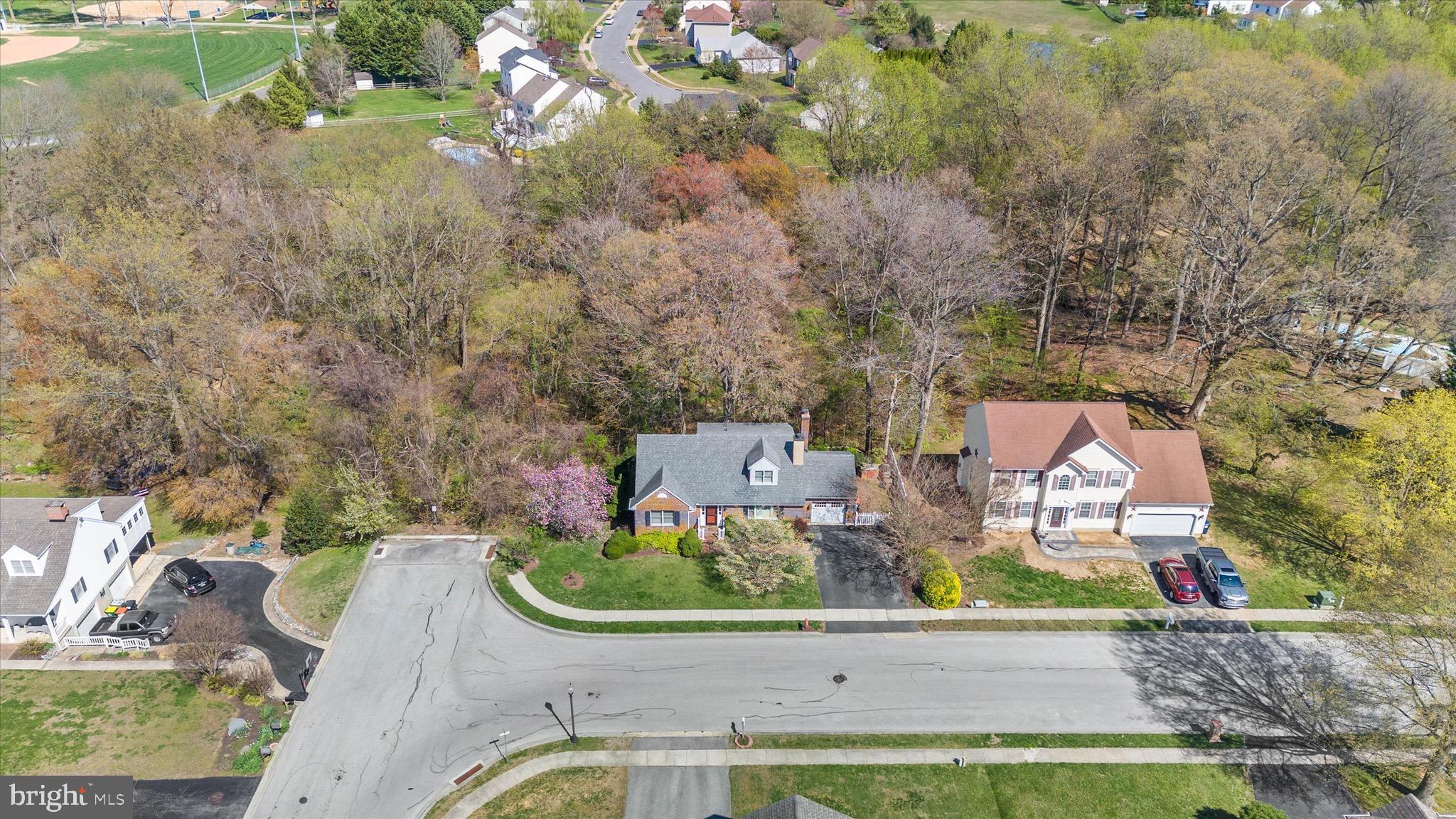 701 Christopher Drive Middletown, DE 19709 - Photo 10 of 57 an aerial view of a house with yard swimming pool and outdoor seating
