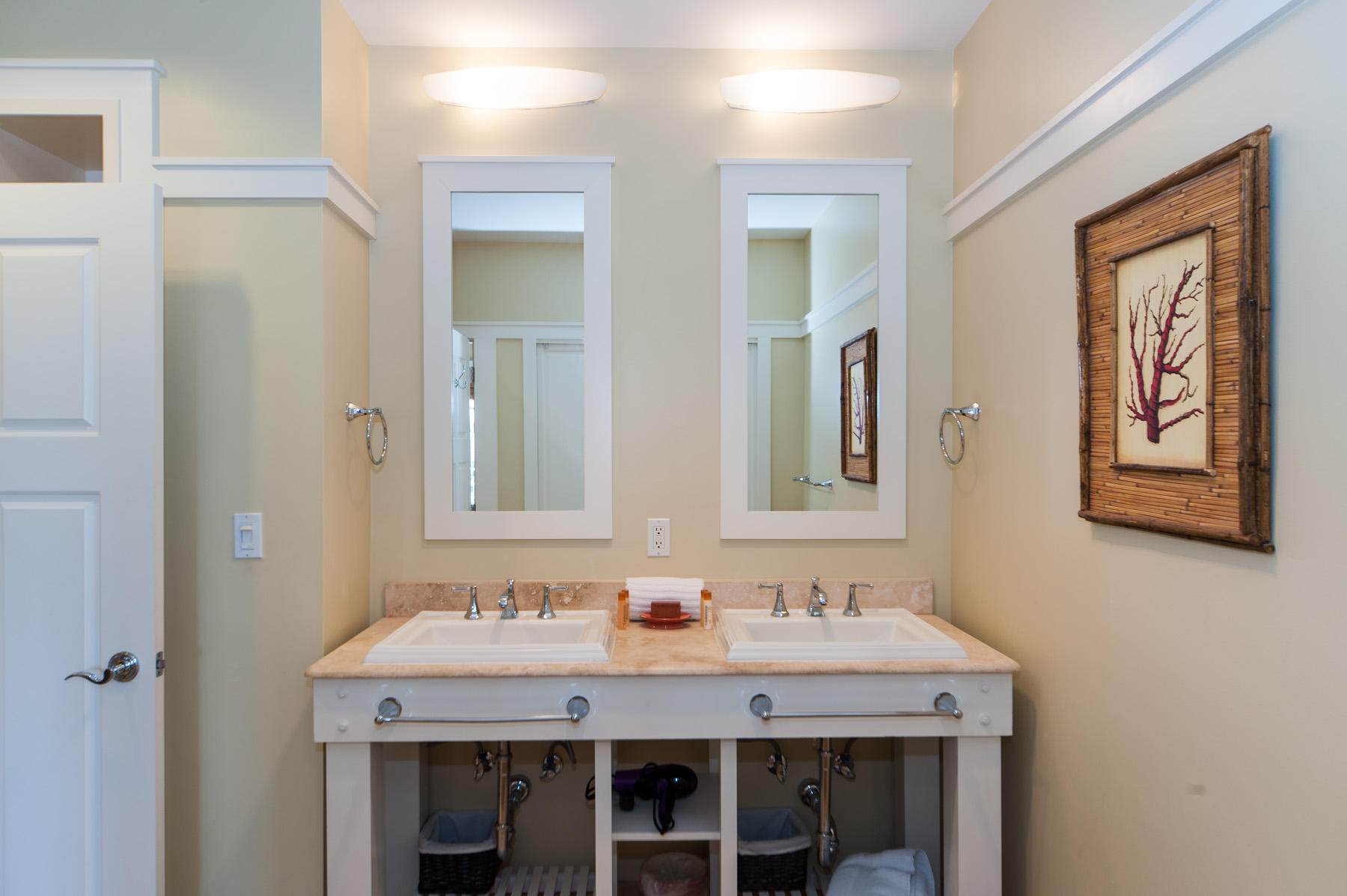 99 Compass Point Way, Unit 302 Watersound, FL 32461 - Photo 7 of 19 a bathroom with a granite countertop sink and a mirror