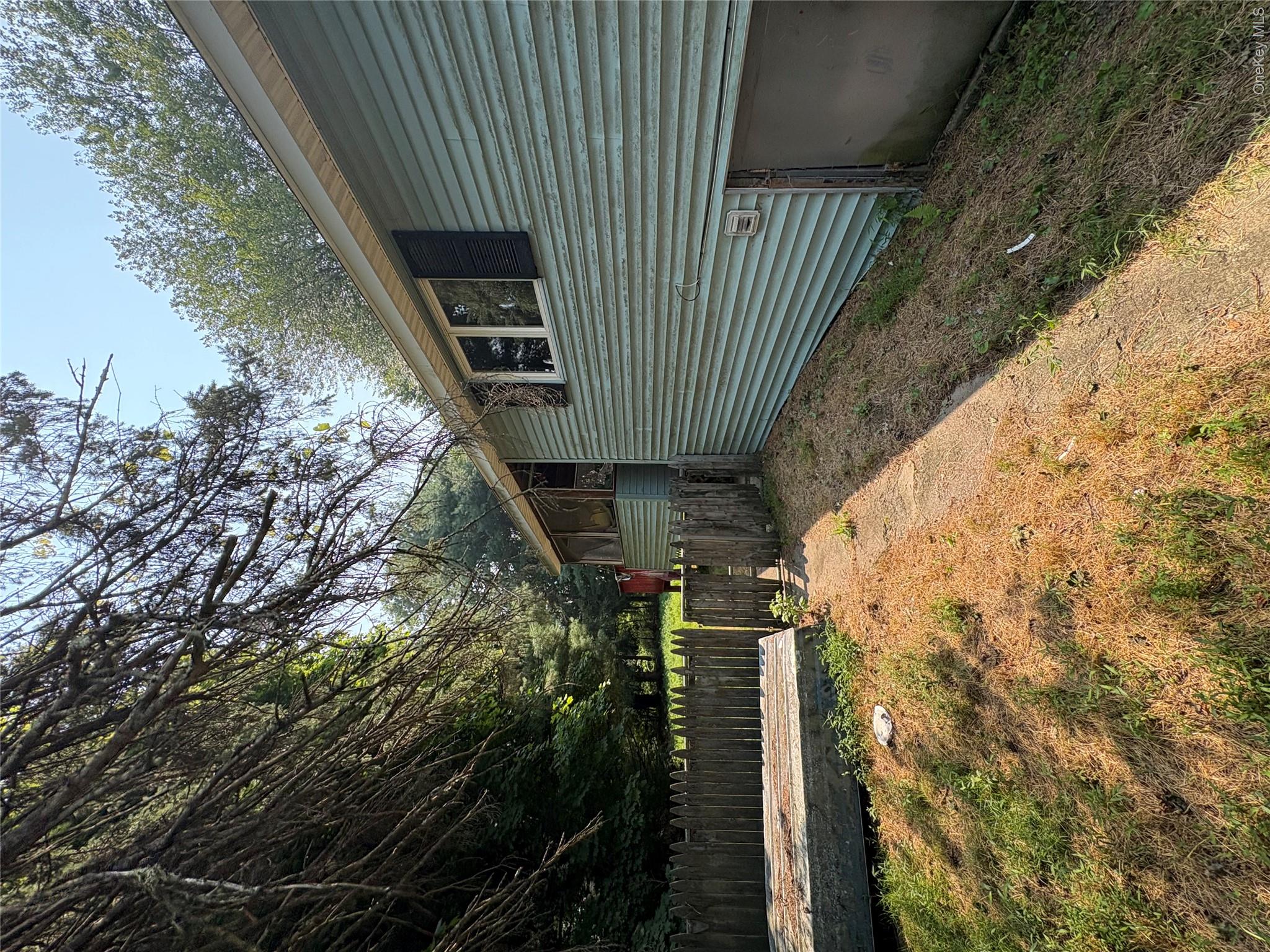 11 Chase Road Wallkill, NY 12589 - Photo 5 of 10 View of yard featuring a sunroom